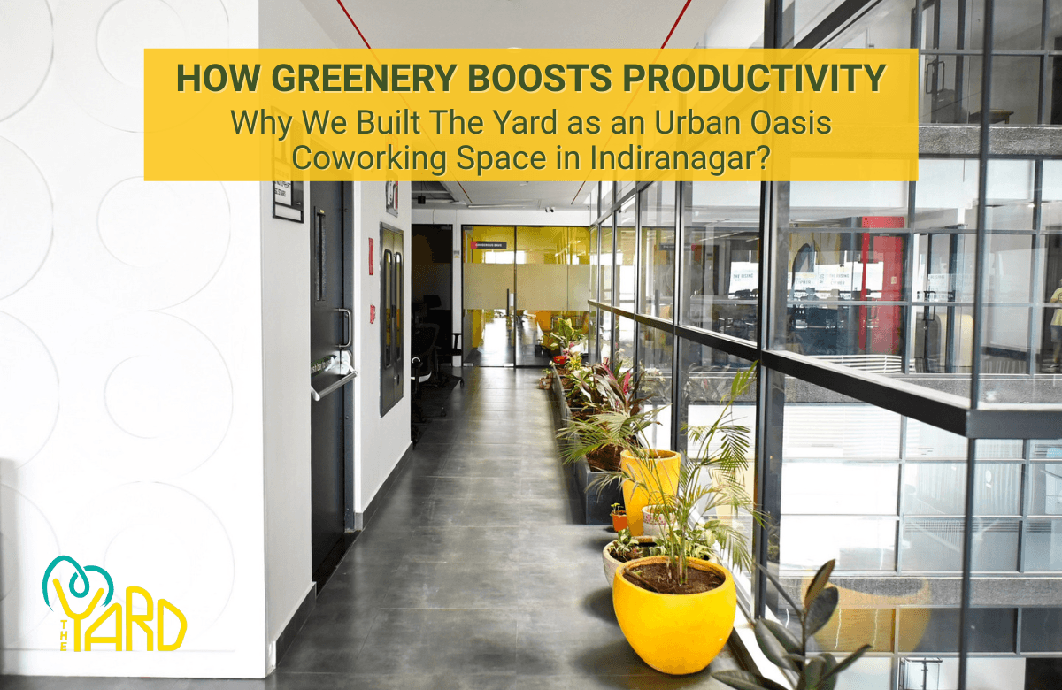 Green indoor corridor with potted plants at The Yard coworking space in Indiranagar, designed as an urban oasis to boost focus and productivity
